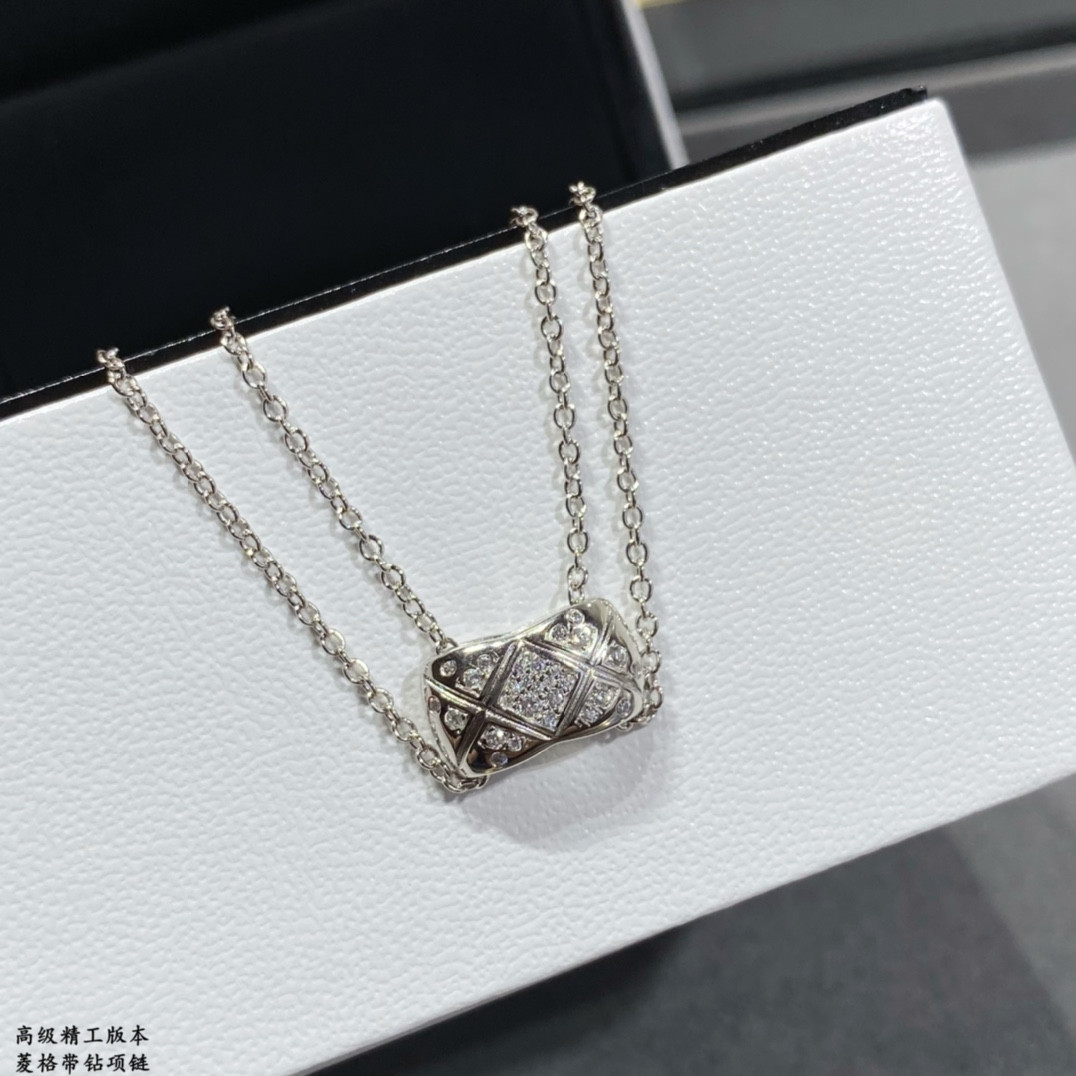 ch*el carved Di*m*nd with Di*m*nd necklace