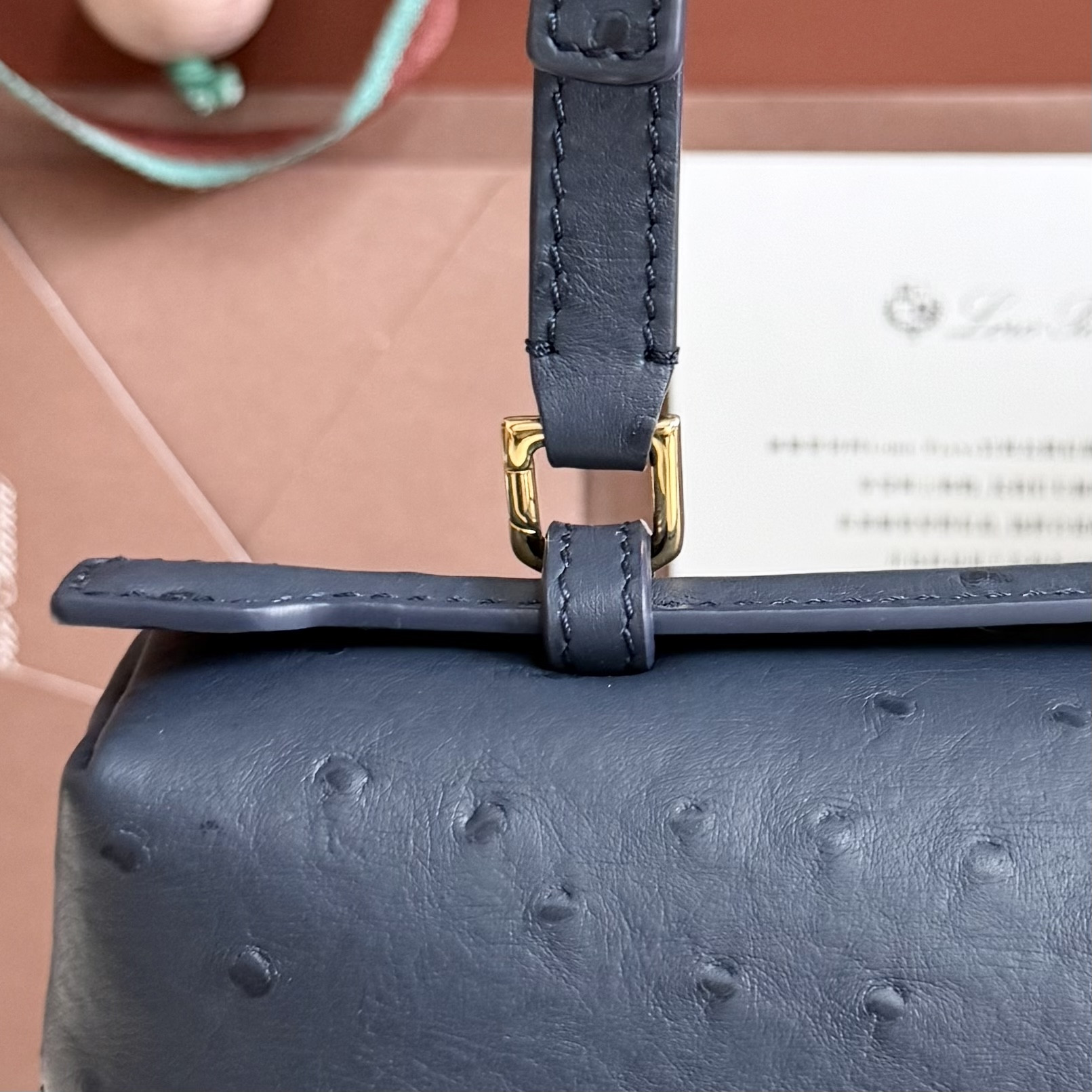 L**o p*ana extra pocket l27 ostrich-grained leather 16x27x10cm